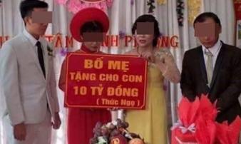 Cô dâu chú rể và tấm biển quà cưới 'tặng 10 tỷ đồng' gây tranh cãi mạng xã hội Cô dâu chú rể và tấm biển quà cưới 'tặng 10 tỷ đồng' gây tranh cãi mạng xã hội