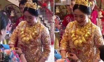 Cô dâu đeo cả yến vàng trong ngày cưới gây xôn xao mạng TQ Cô dâu đeo cả yến vàng trong ngày cưới gây xôn xao mạng TQ