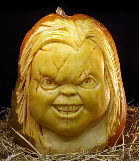 Pumpkin carved in the image of horror doll Chucky