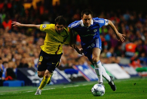 LONDON, ENGLAND - MAY 06:  John Terry of Chelsea battles for the ball with Lionel Messi of Barcelona  during the UEFA Champions League Semi Final Second Leg match between Chelsea and Barcelona at Stamford Bridge on May 6, 2009 in London, England.  (Photo by Clive Rose/Getty Images)