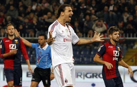 Ac Milan's Zlatan Ibrahimovic celebrates after scoring against Genoa during their Italian Serie A soccer match at the Luigi Ferraris stadium in Genoa December 2, 2011.