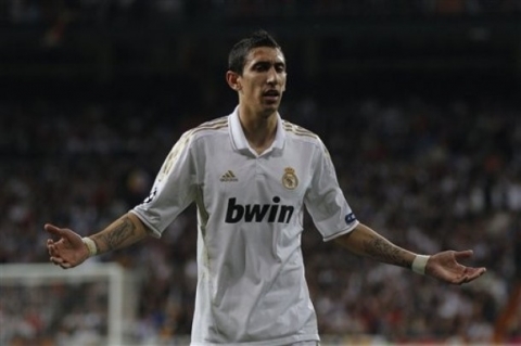 Real Madrid's Angel Di Maria from Argentina reacts during a semi final second leg Champions League soccer match against Bayern Munich at the Santiago Bernabeu stadium, in Madrid, Wednesday, April 25, 2012.