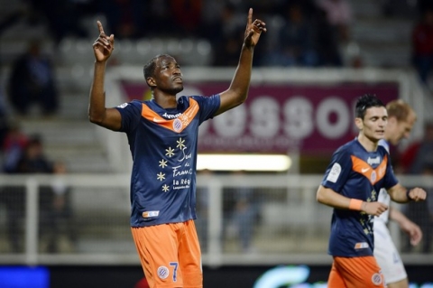 Montpellier's Nigerian forward John Utaka (L) celebrates after scoring a goal during the French L1 football match Auxerre vs Montpellier, on May 20, 2012 at the Abbe-Deschamps stadium in Auxerre.