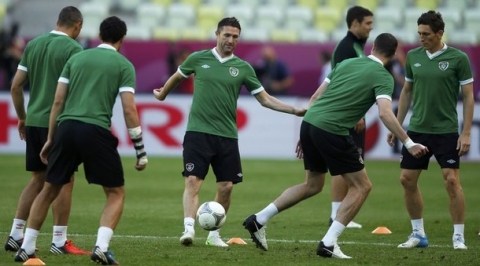 Ireland's Robbie Keane (C) plays the ball during a training session for the Euro 2012  at the PGE Arena Stadium in Gdansk June 13, 2012. Ireland will play its second match of the Euro 2012 soccer championships against Spain in Gdansk, Poland on June 14.