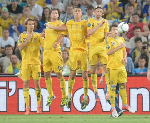 Ukraine playes (from L) forward Marko Devic, forward Artem Milevskiy, defender Yevhen Khacheridi, midfielder Anatoliy Tymoshchuk and midfielder Yevhen Konoplyanka stop a free kick during the Euro 2012 championships football match Ukraine vs France on June 15, 2012 at the Donbass Arena in Donetsk.