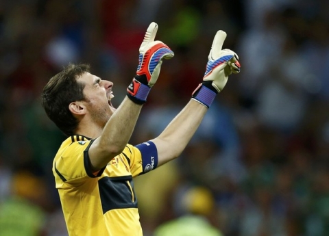 Spain's goalkeeper Iker Casillas celebrates after third goal, scored by Fernando Torres (not pictured) during their Euro 2012 final soccer match against Italy at the Olympic stadium in Kiev, July 1, 2012.