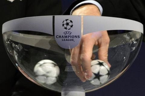 UEFA General Secretary Gianni Infantino draws a ball  during the draw of the games of the third qualifying round of the UEFA Champions League 2012/13 at the UEFA Headquarters in Nyon, Switzerland, Friday, July 20, 2012.