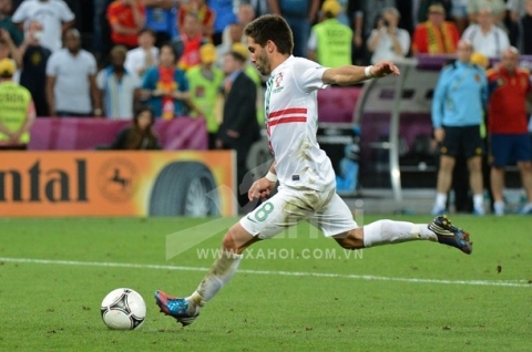 Portuguese midfielder Joao Moutinho kicks a penalty during the penalty shoot out of the Euro 2012 football championships semi-final match Portugal vs. Spain on June 27, 2012 at the Donbass Arena in Donetsk.