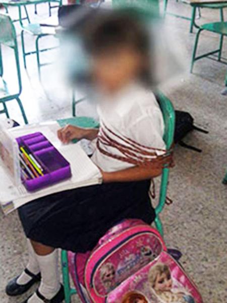 Giao vien troi hoc sinh 6 tuoi theo yeu cau cua phu huynh hinh anh 1