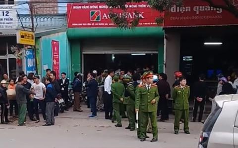 Kẻ bịt mặt dọa nổ bom ngân hàng cướp tiền - 1