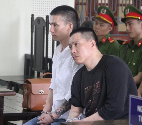 Bị cáo Đông và bị cáo Trinh tại phiên tòa