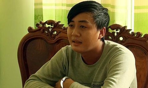 Nguyễn Minh Thanh tại cơ quan công an. Ảnh: báo Công an.