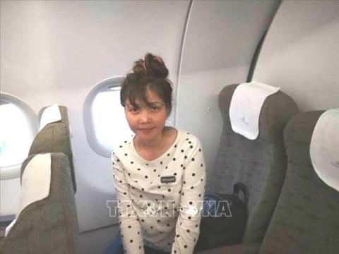 Hinh anh Doan Thi Huong tren chuyen bay ve Viet Nam hinh anh 1 
