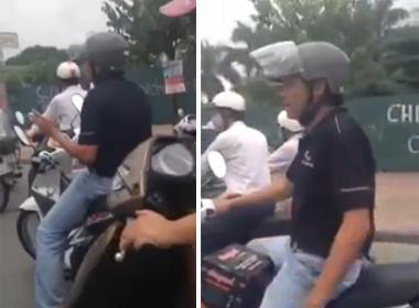 Nam thanh niên hồn nhiên múa hát trong lúc đợi đèn đỏ ở Hà Nội nam thanh nien mua hat cho den do, mua hat cho den do, hon nhien mua hat tren duong