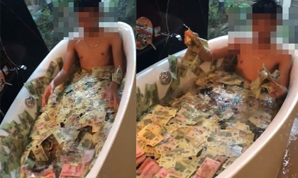'Thiếu gia' Việt rải đầy tiền vào bồn tắm