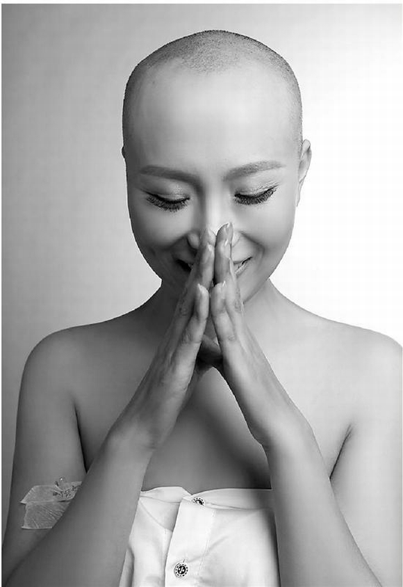 Nghị lực đáng ngưỡng mộ của bà mẹ đơn thân bị ung thư Nghị lực đáng ngưỡng mộ của bà mẹ đơn thân bị ung thư
