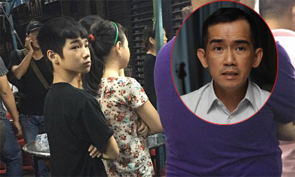 Con nuôi Minh Thuận đứng lặng người trong đám tang cha nuôi