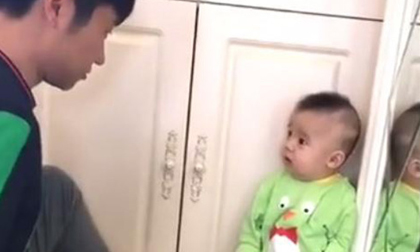 Dân mạng 'bấn loạn' trước biểu cảm siêu đáng yêu của bé trai khi bị bố mắng