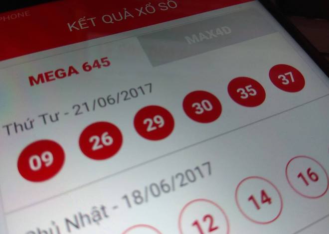 Vé trúng jackpot mới nhất của Vietlott: Sáng mua, chiều đã trúng - 1