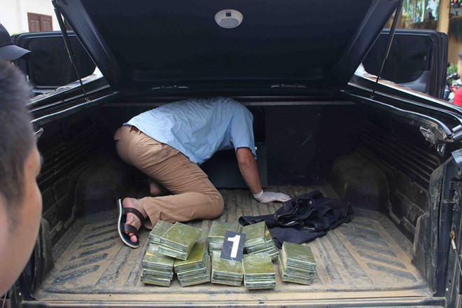Nguoi phu nu lai xe ban tai cho 30 banh heroin hinh anh 2