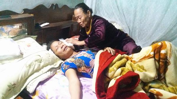 tang thuong xom ngheo co con tu nan o dai loan - 1
