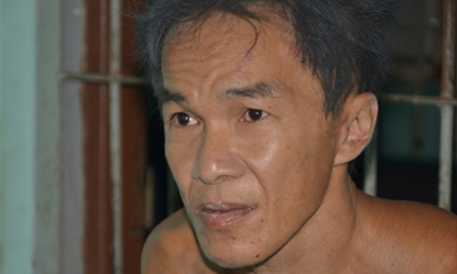 Chém lìa đầu hàng xóm, tấn công Cảnh sát khi bị vây bắt