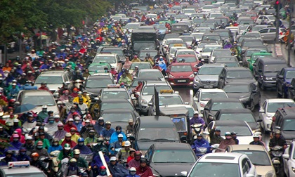 Hà Nội mù mịt, tắc cứng trong mưa phùn