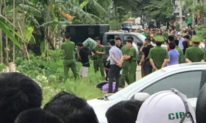 Công an dẫn giải nghi phạm ra dựng lại hiện trường vụ sát hại nam sinh rồi vứt xác phi tang