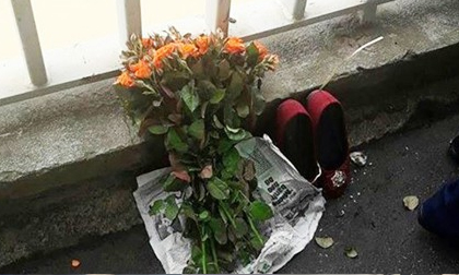 Cô gái để lại bó hoa hồng và đôi giày nhảy cầu tự tử