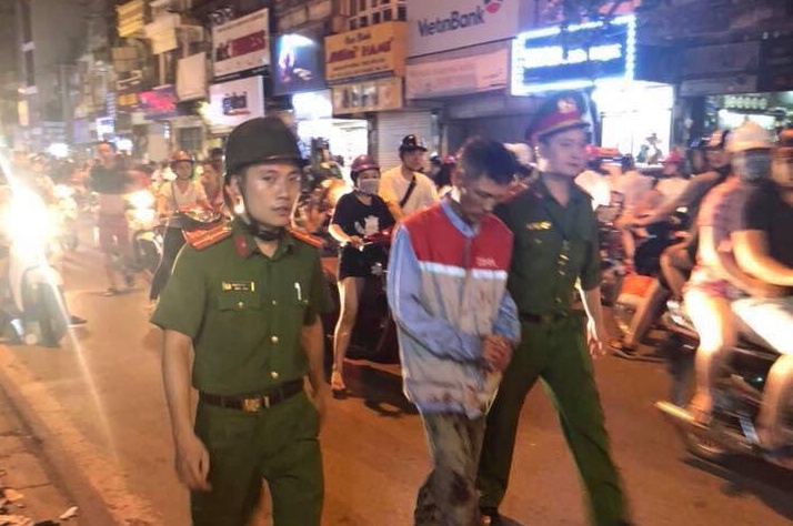  Hình ảnh người đàn ông bị bắt giữ.