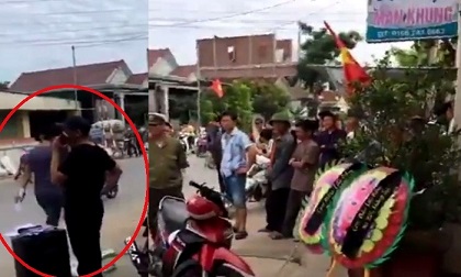 Mang vòng hoa tang, mở nhạc đám ma đến nhà trưởng công an đòi nợ