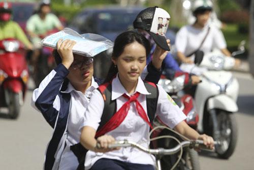 tin moi thoi tiet 23/6: ha noi tiep tuc chuoi ngay nang nong, dem chuyen mua dong, gio manh - 1