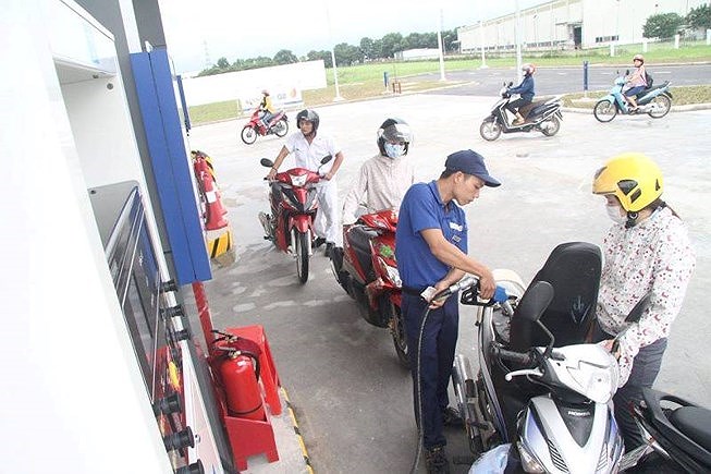 Giá xăng dầu được điều chỉnh như thế nào trong chiều nay? - 1