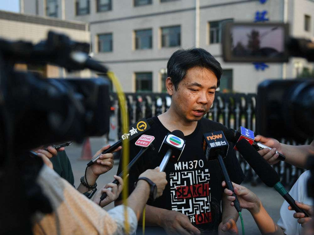 nguoi than trung quoc phan no vi ban bao cao mh370 hinh anh 1