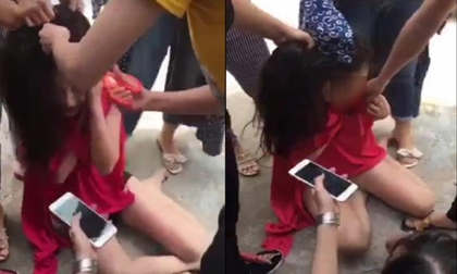 Hotgirl bị cắt tóc, xé quần áo, bắt đọc mật khẩu điện thoại vì nghi cặp bồ với đại gia