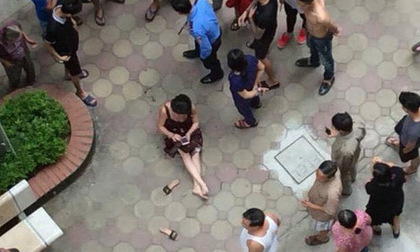 Hà Nội: Uẩn khúc vụ rút súng bắn vợ giữa sân chung cư