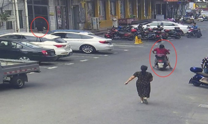 Bị người phụ nữ truy đuổi suốt 2 km, tên trộm chắp tay xin tha vì 'không thở được nữa rồi'