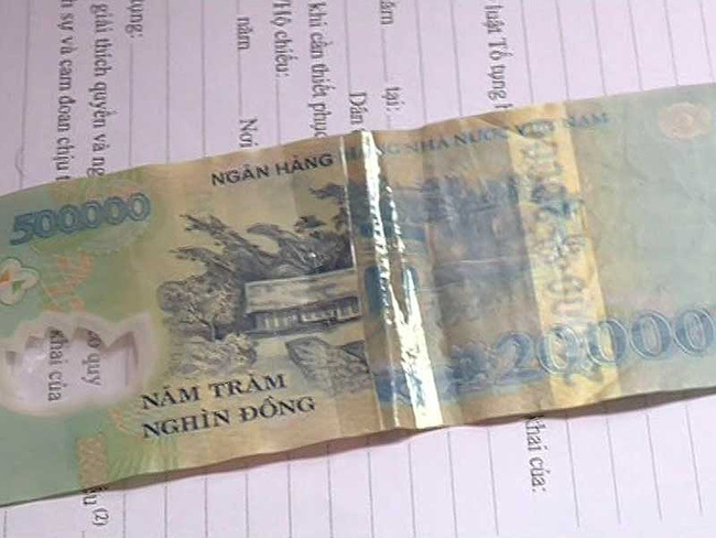 Cảnh giác chiêu biến tờ 20.000 đồng thành 500.000 đồng - Ảnh 1.