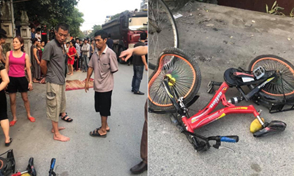 Hà Nội: Xe bán tải tông 2 chị em chở nhau xe đạp, bé gái 7 tuổi chết thảm