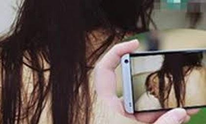 Bắt tạm giam ông lão dùng clip phòng the tống tiền bạn gái