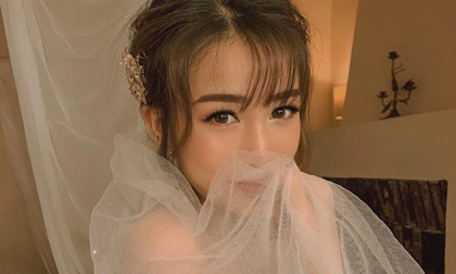 Con gái 20 tuổi của Minh Nhựa khoe ảnh mặc váy cô dâu, ông bố đại gia vào bình luận bất ngờ