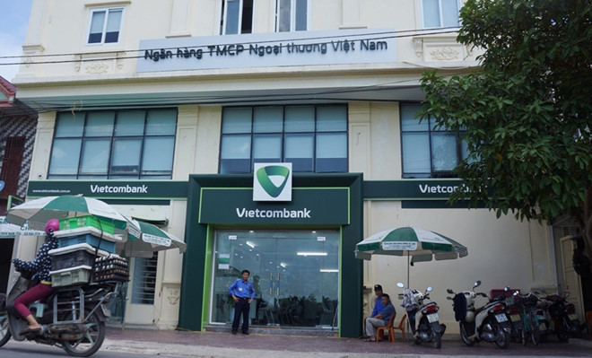 Nguoi xong vao ngan hang Vietcombank no sung la thuong uy cong an hinh anh 1