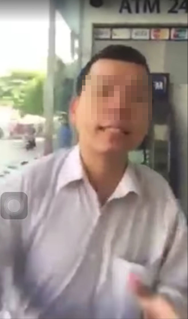 Vụ đánh phụ nữ vì bị nhắc xếp hàng khi rút tiền ATM: Tát 2 cái, mất 6,5 triệu - 1