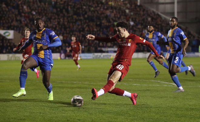 Minamino gay that vong, Liverpool dut chuoi tran thang hinh anh 2 2020_01_26T171633Z_32934987_RC2TNE95EEV9_RTRMADP_3_SOCCER_ENGLAND_SHT_LIV_REPORT.JPG