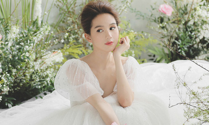 Sau chia sẻ muốn có con, Ngọc Trinh tung bộ ảnh mặc váy cưới đẹp đến nao lòng