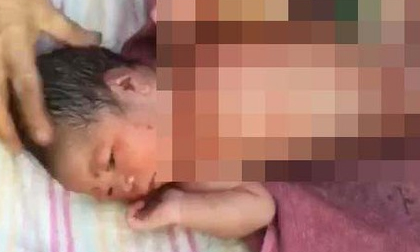 Bé sơ sinh còn nguyên dây rốn bị bỏ rơi trong nghĩa địa