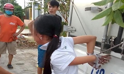 Mất tiền, gia đình trói cháu gái 12 tuổi vào thùng xe tải đánh đập