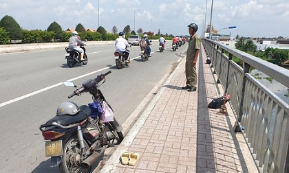 Vay tiền công ty tài chính, một người bị hù dọa đòi nợ, nhảy cầu tự tử