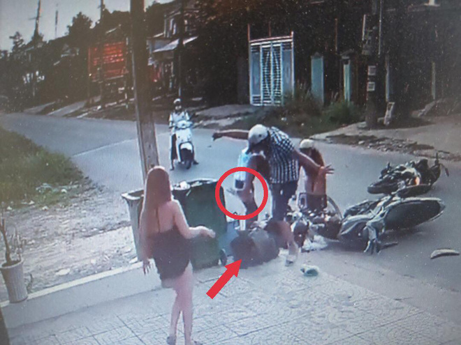 Kẻ đá vào mặt nữ sinh, dùng gậy ba khúc quật nạn nhân sau va chạm giao thông khai gì? - Ảnh 2.