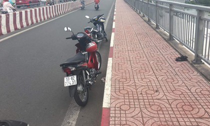 Để lại xe máy trên cầu, người phụ nữ bất ngờ nhảy xuống sông Sài Gòn tự tử